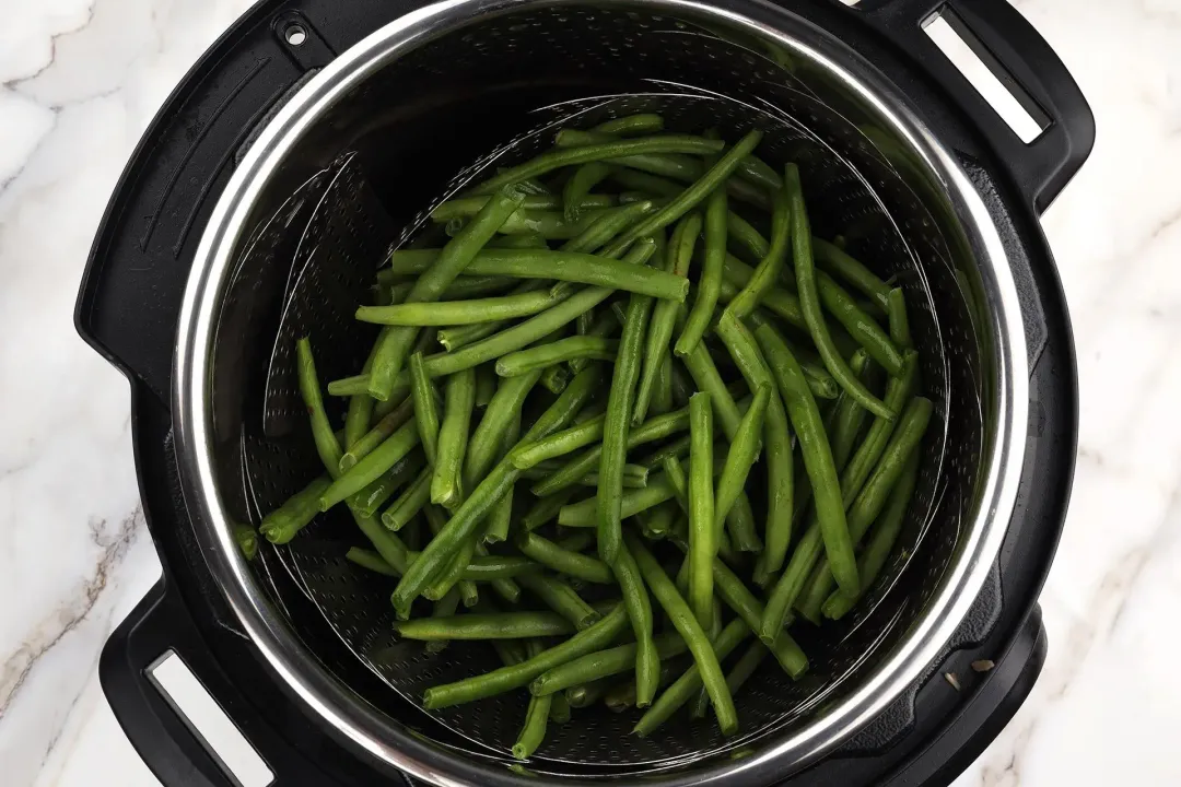 Steam the green beans in the Instant Pot