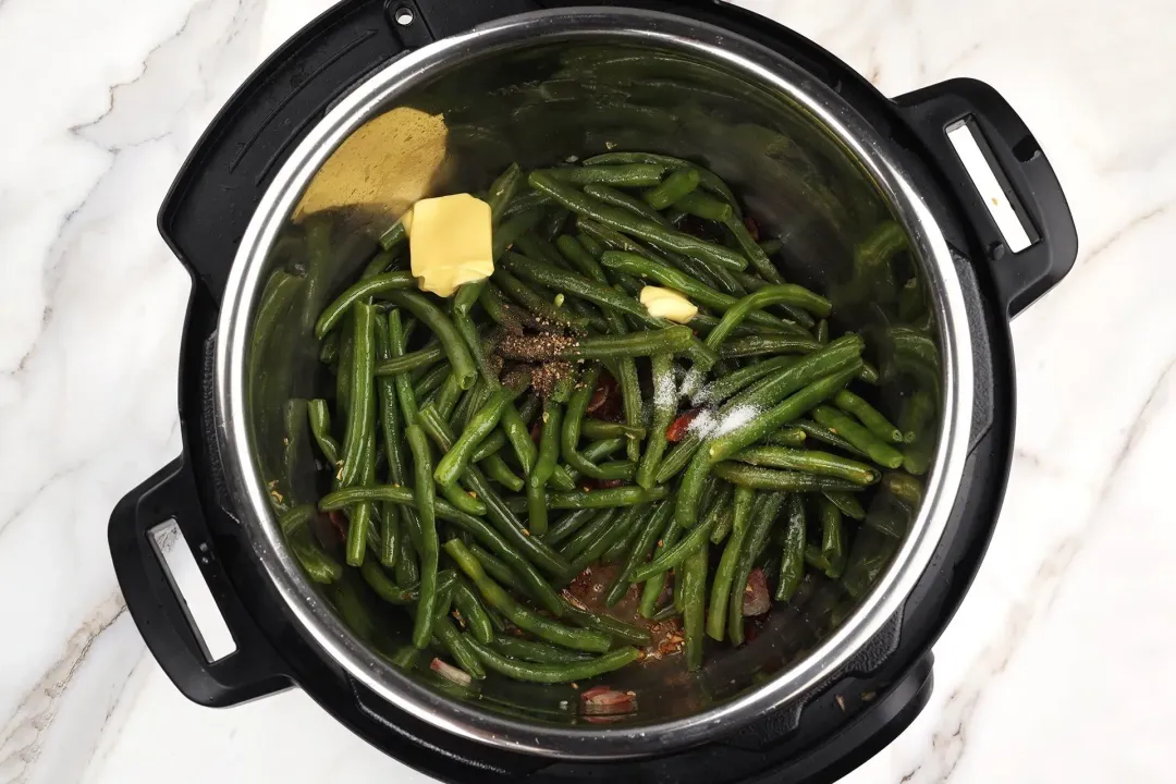 Stir fry and season the green beans