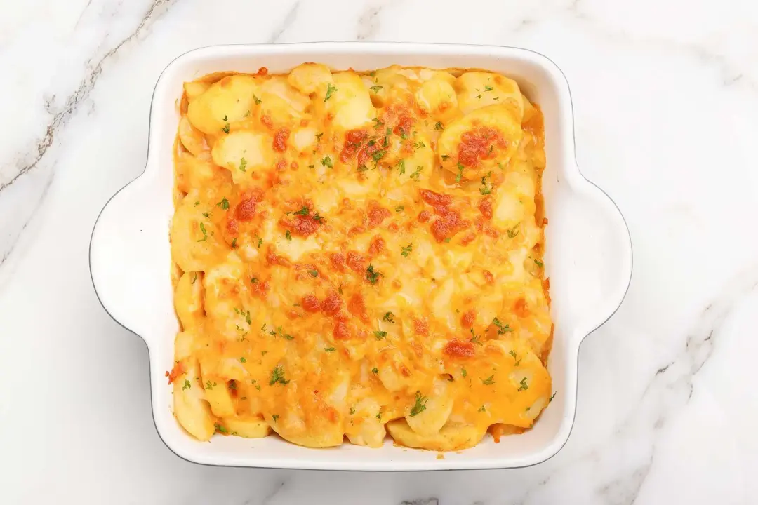 Top with parsley and serve scalloped potatoes