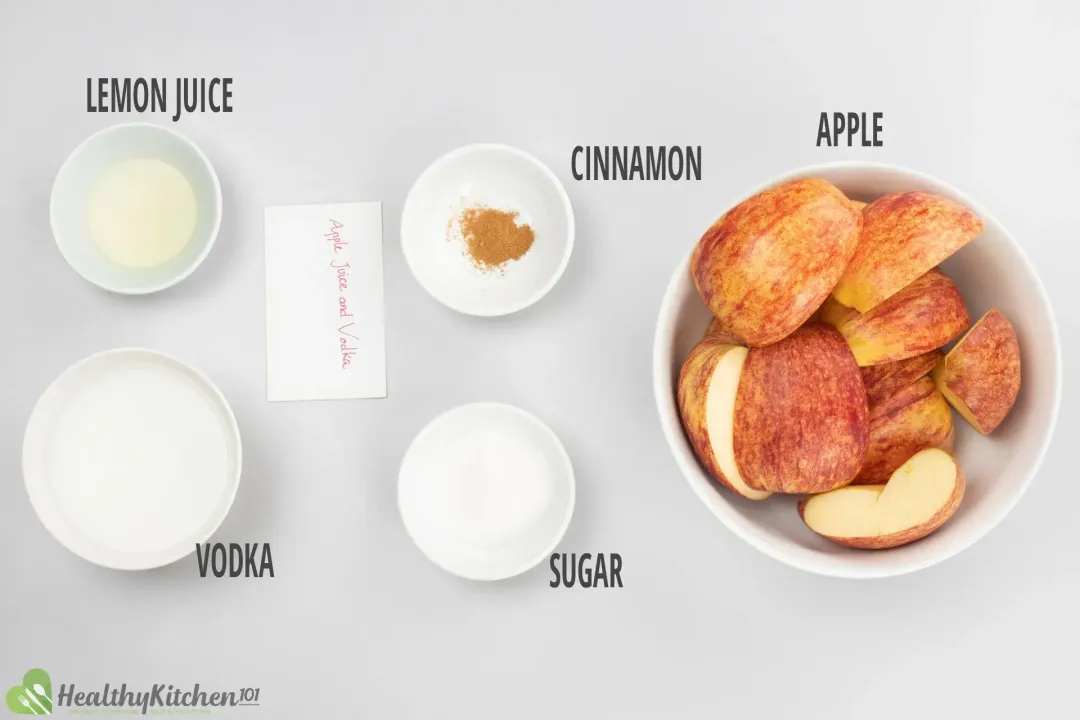 Ingredients in separate bowls: apple wedges, lemon juice, cinnamon powder, sugar, and vodka