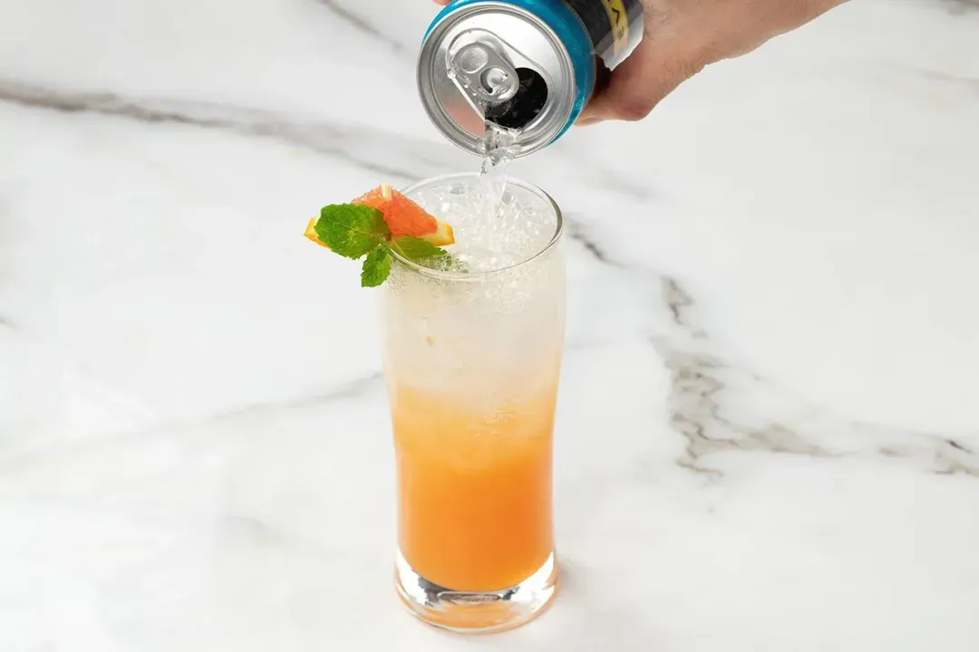 Garnish add soda and serve