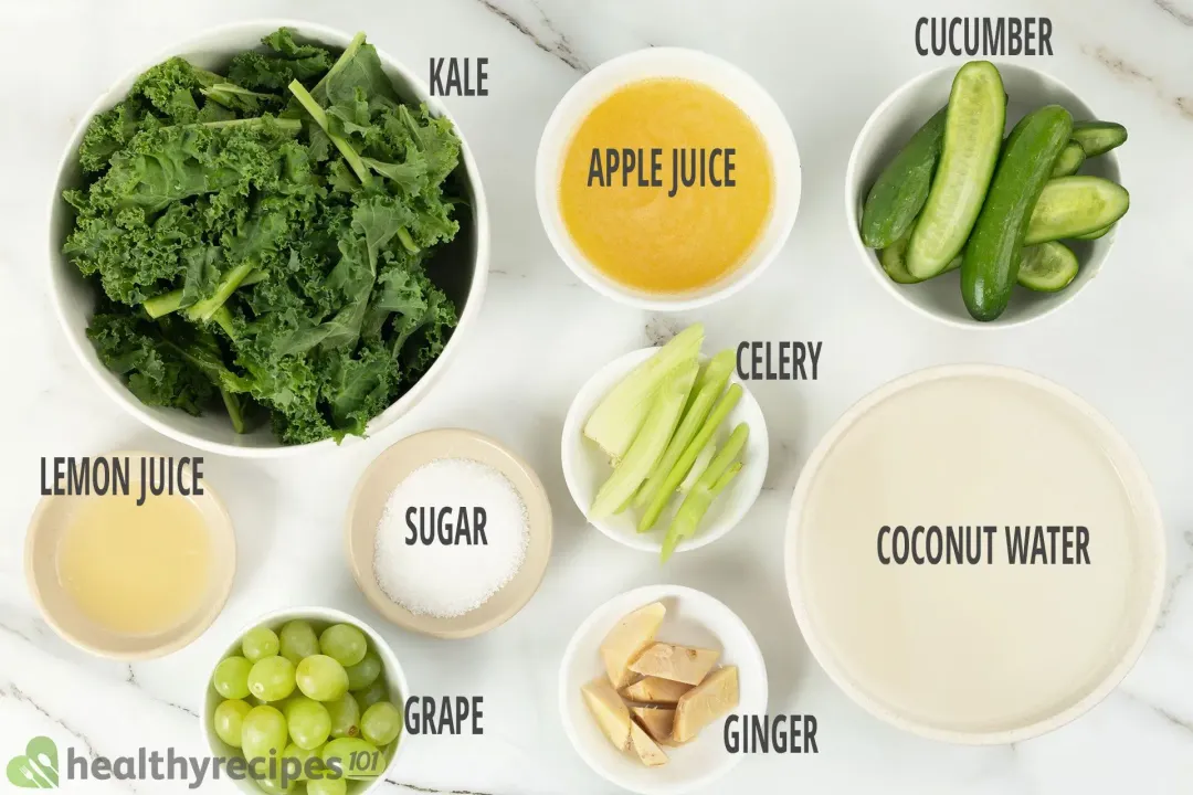 Ingredients for this green machine juice: kale, lemon juice, apple juice, halved cucumbers, coconut water, sliced ginger, sugar, grapes, and celery