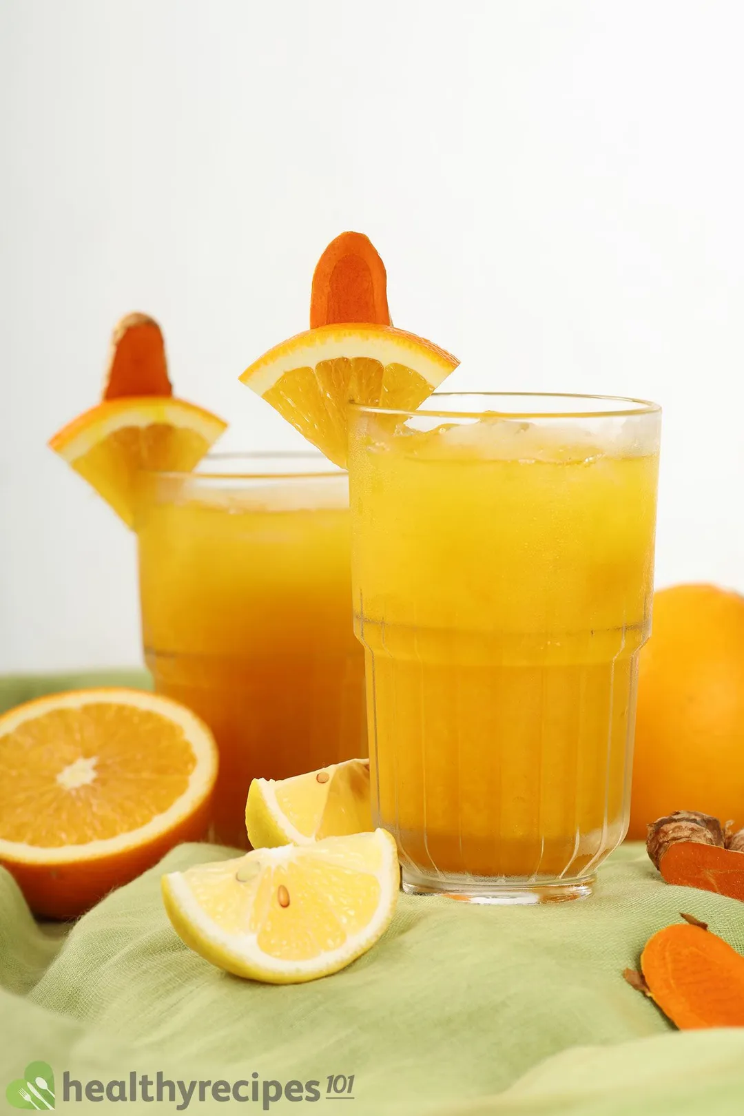 two glass of orange turmeric juice
