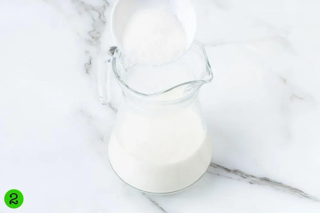 Granulated sugar added to a milk pitcher