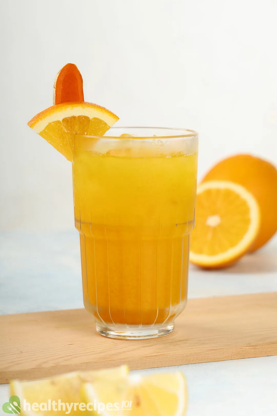 a glass of orange turmeric juice