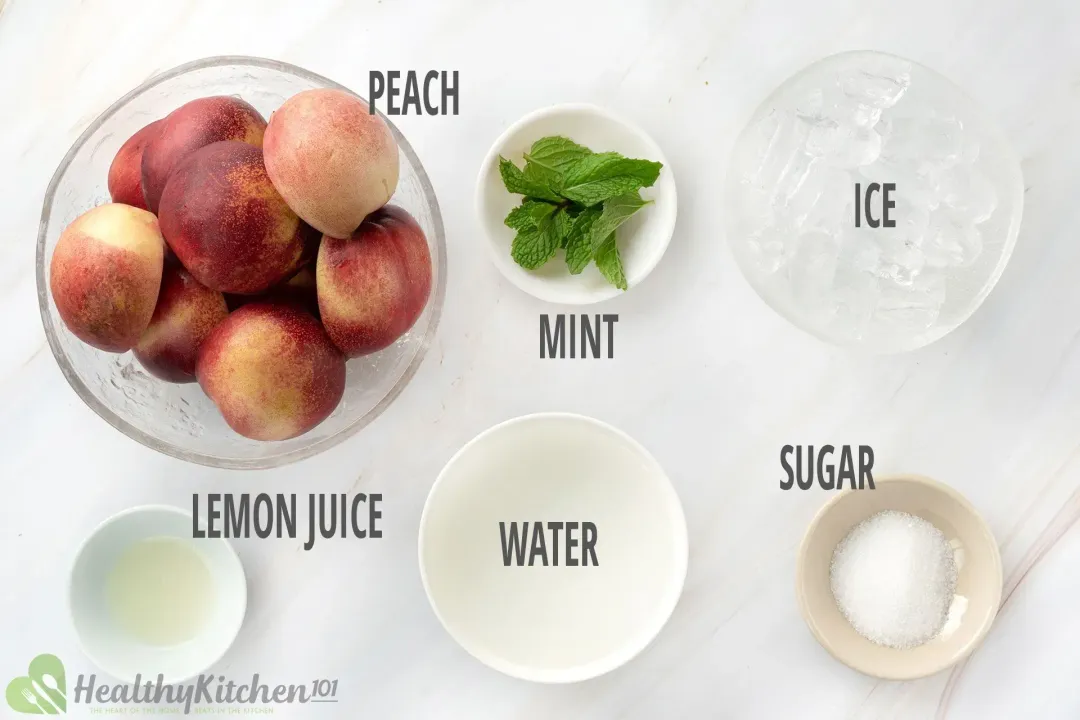 Ingredients in separate bowls: whole peaches, mint leaves, ice nuggets, lemon juice, water, and sugar