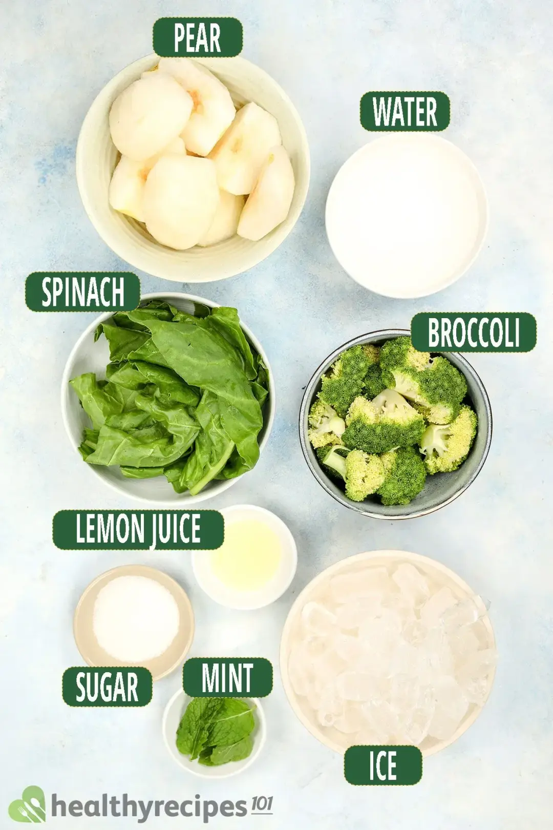 Ingredients in separate bowls: peeled and quartered pears, sugar, water, broccoli, spinach, mints, and ice nuggets