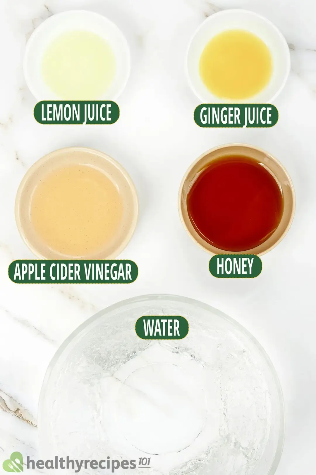 Ingredients in separate bowls: lemon juice, ginger juice, apple cider vinegar, honey, water
