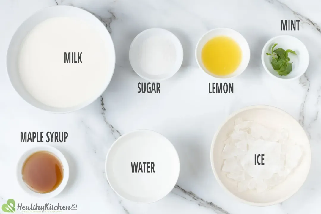Ingredients in separate bowls: milk, sugar, lemon juice, mints, maple syrup, water, ice nuggets
