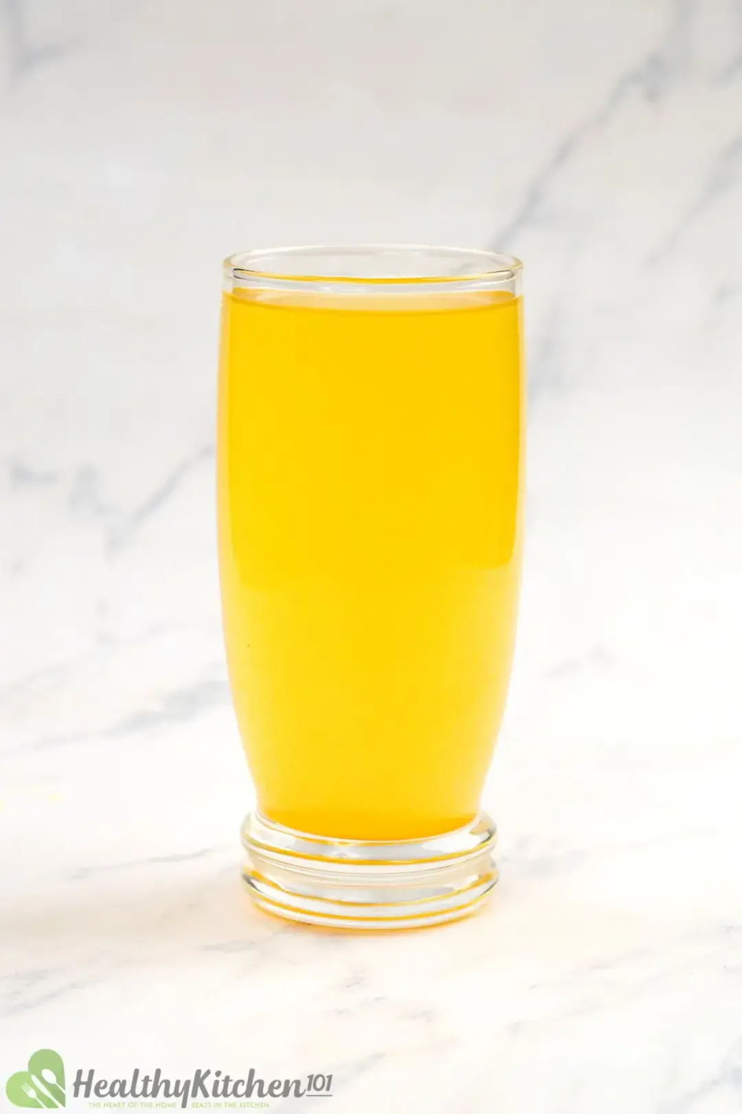 a glass of turmeric and apple cider vinegar