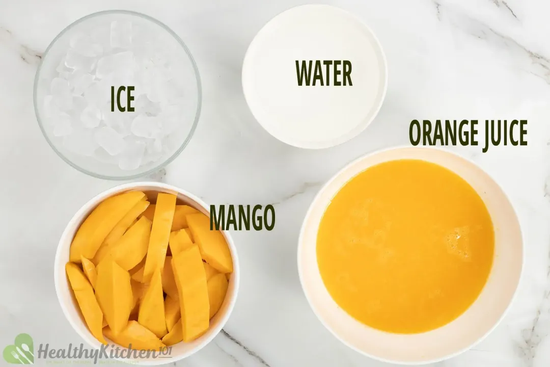Ingredients in separate bowls: ice nuggets, water, orange juice, cut-up mangoes
