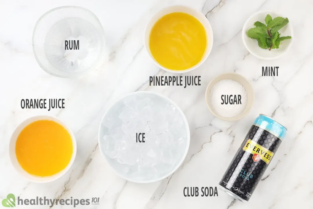 Ingredients in separate bowls: orange juice, pineapple juice, rum, ice nuggets, mints, sugar, and a can of club soda