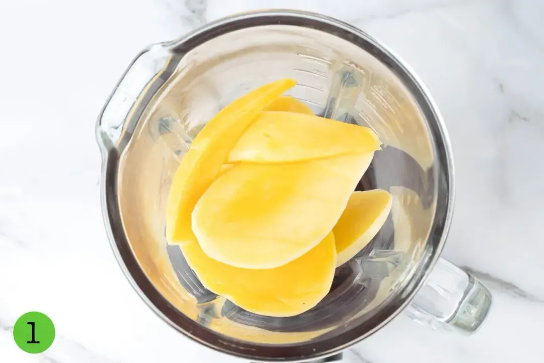 Mangoes inside a blender