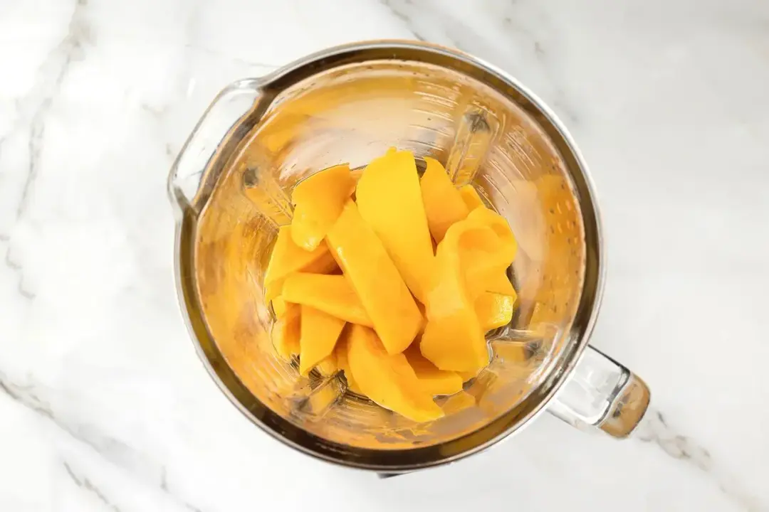Step 1 Blend mangos for orange mango juice