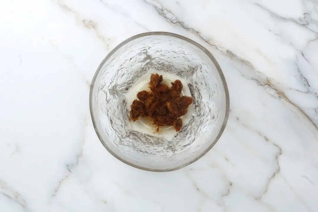 Tamarinds soaked in a clear bowl of clear water