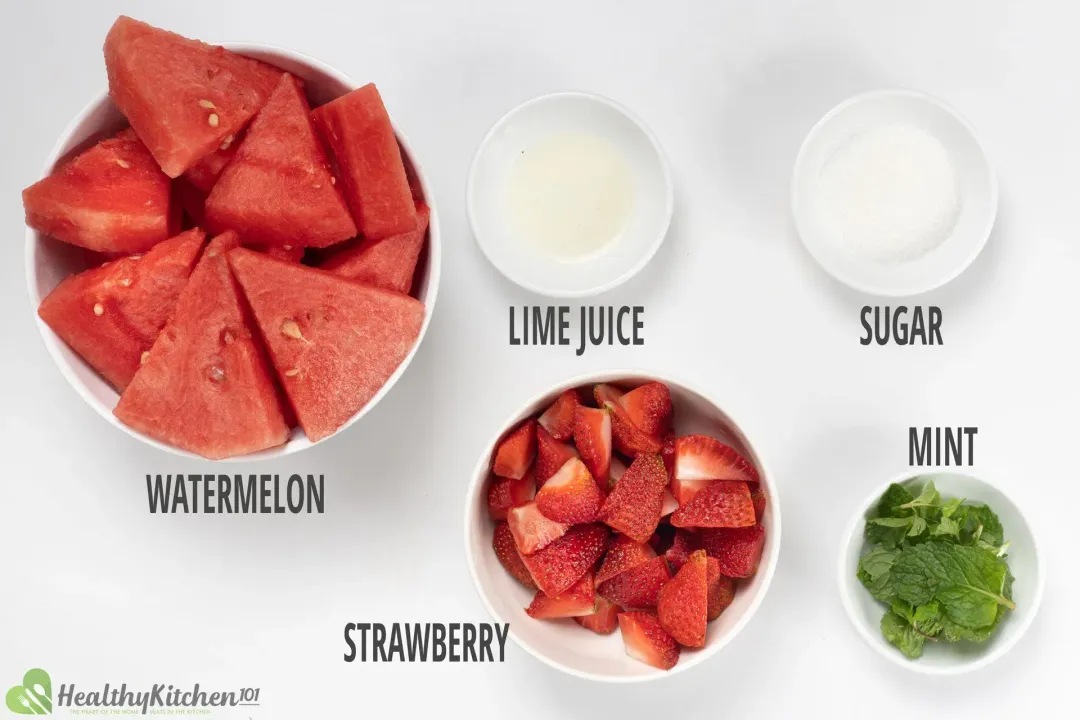 Ingredients of the juice: watermelon, sliced strawberries, mint leaves, lime juice, and sugar