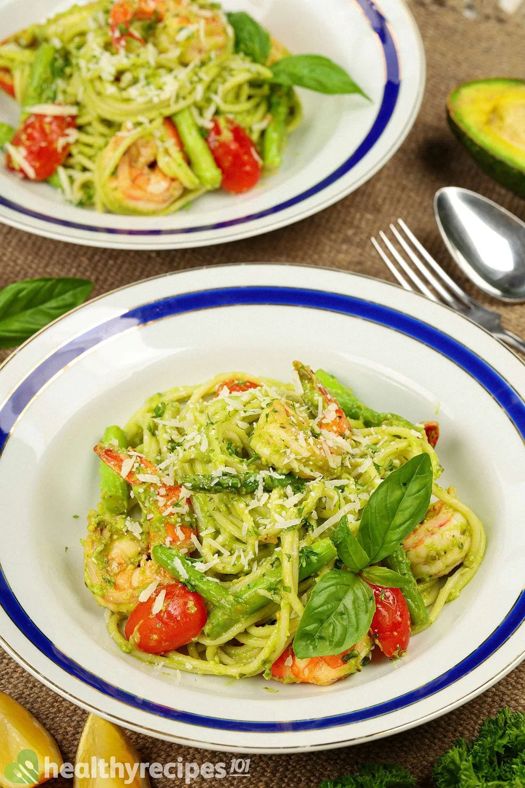 Two plates of avocado pasta