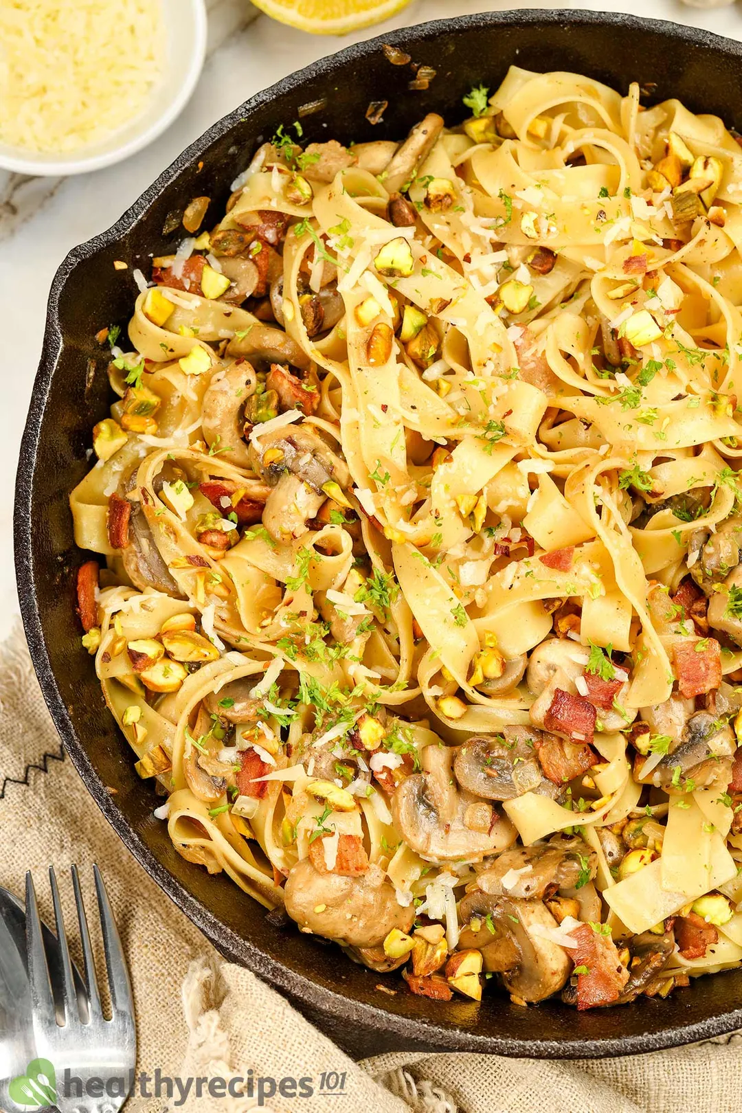 top view of a skillet of cooked mushroom pasta