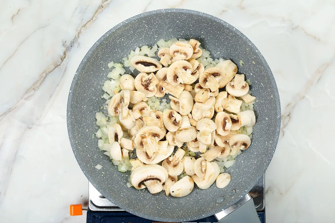 cooking mushroom in a skillet