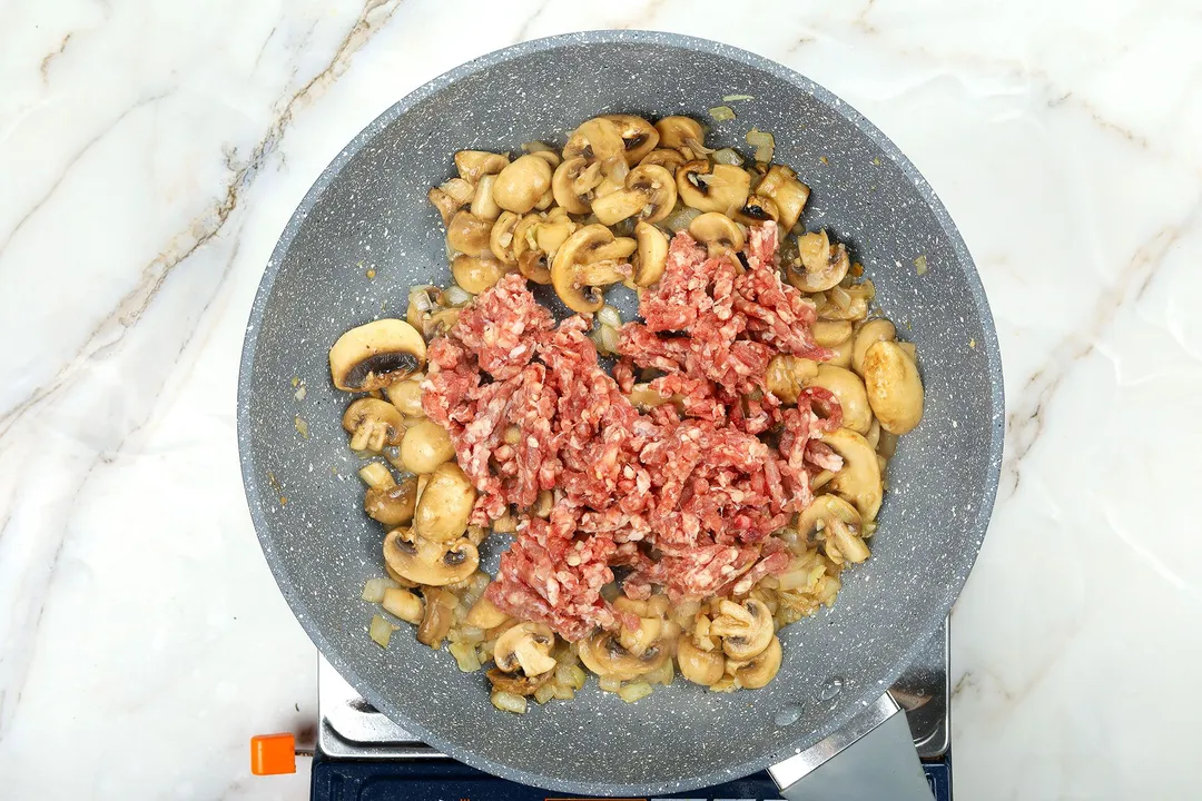 cooking ground beef and mushroom in a skillet