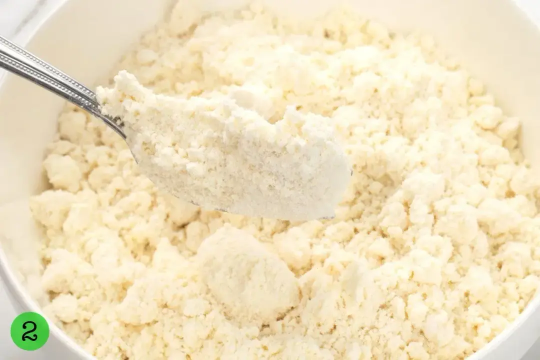 Flour crumbles of all sizes put in a large bowl