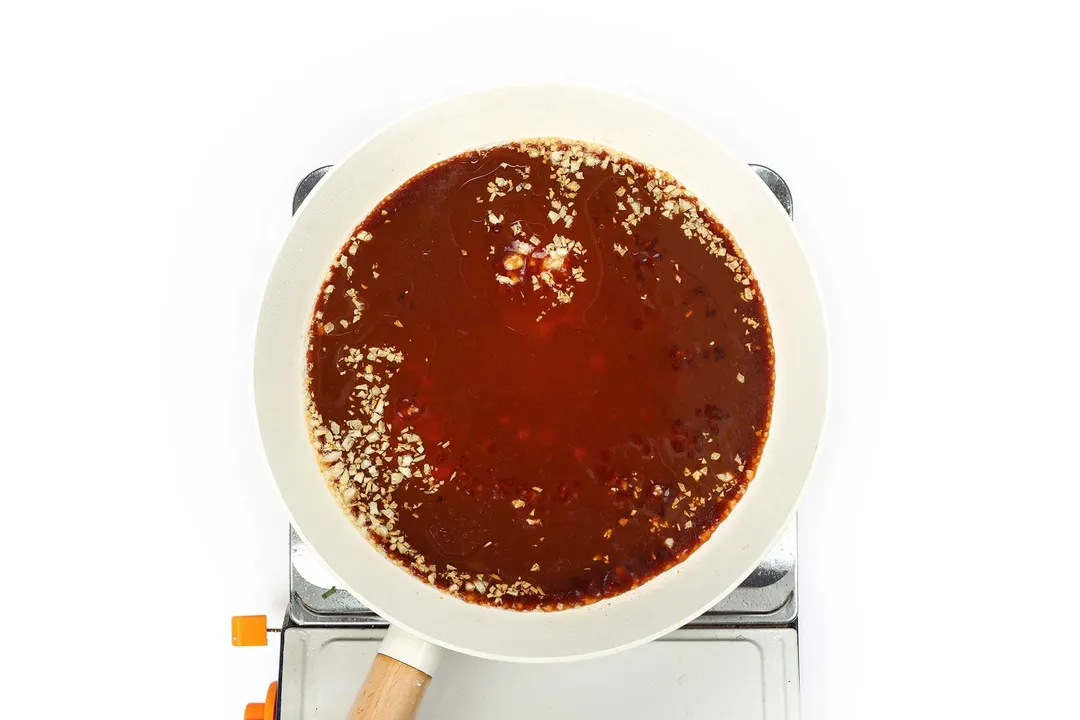 cooking sauce in a skillet