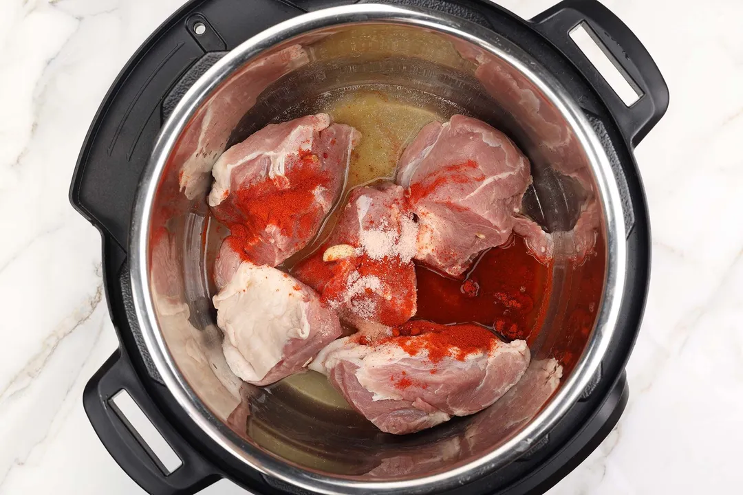 pork cubed and spices, water in an instant pot