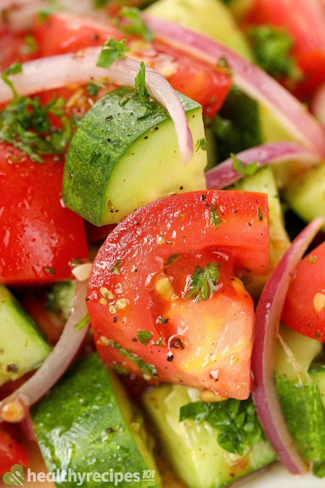 A close-up shot of a cucumber tomato salad