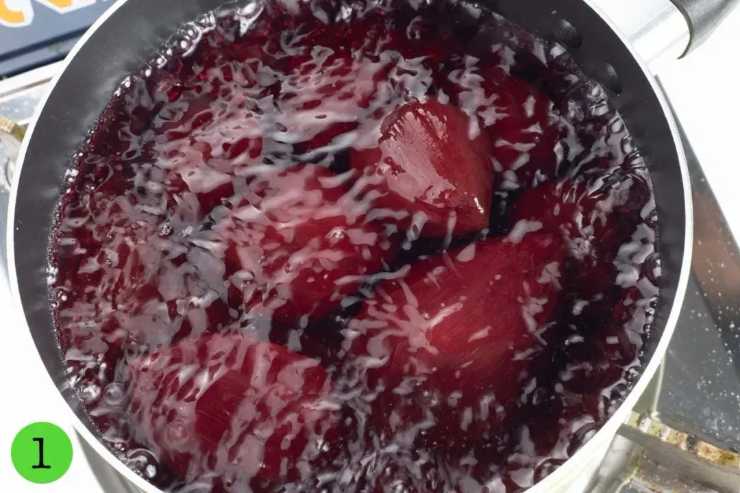 Boiling beetroots in a pot