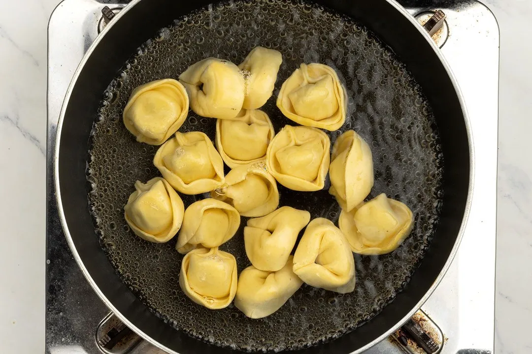 tortellini cooking in a pot