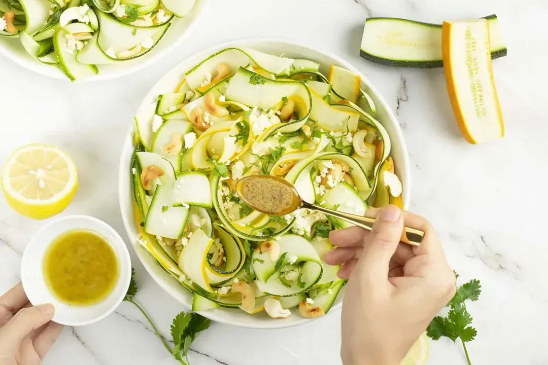 step 3 Add the dressing for zucchini salad