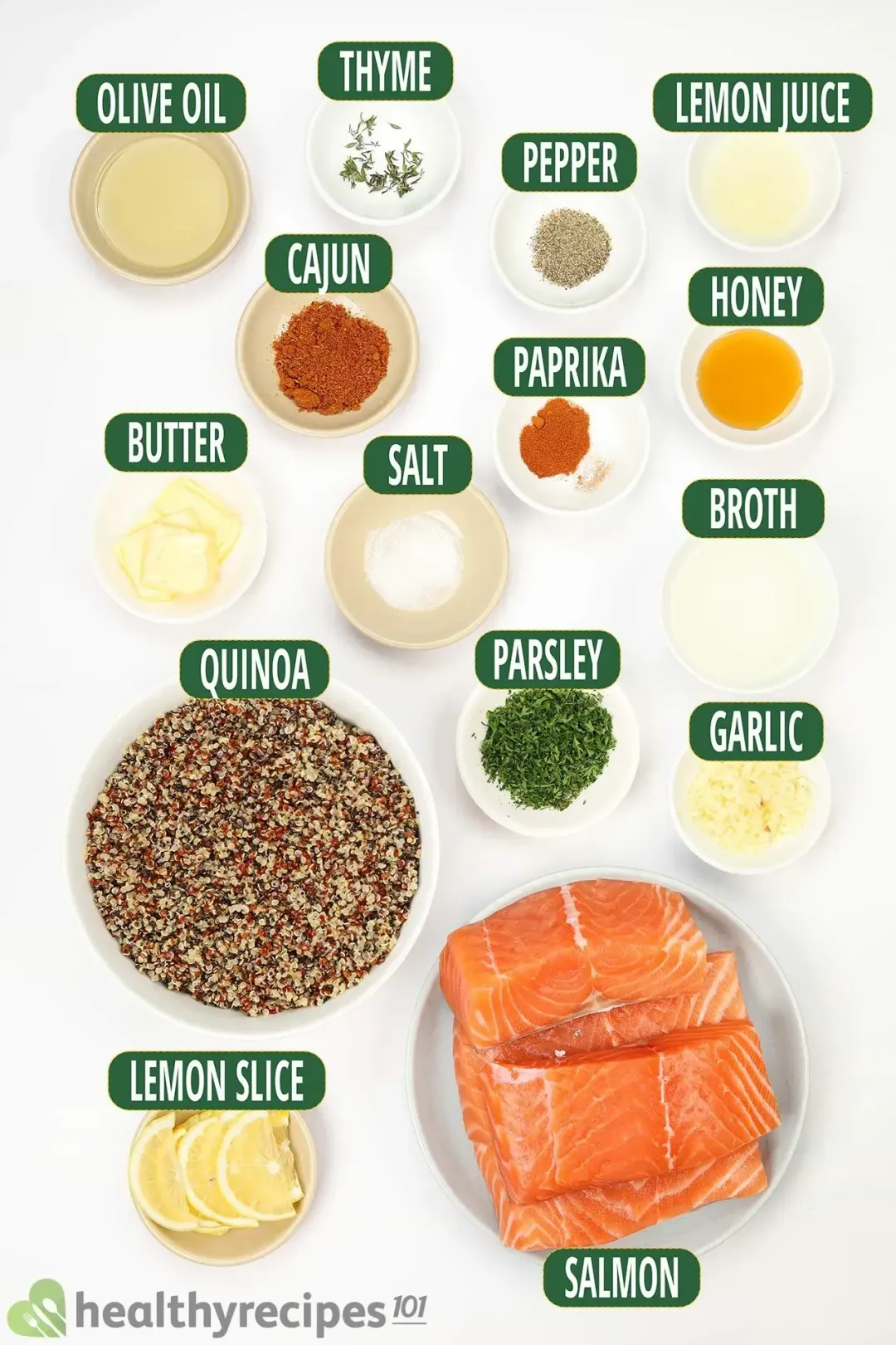 The ingredients include salmon fillets, lemon slices, mixed quinoa, olive oil, lemon juice, honey, butter, broth, and some herbs and spices.