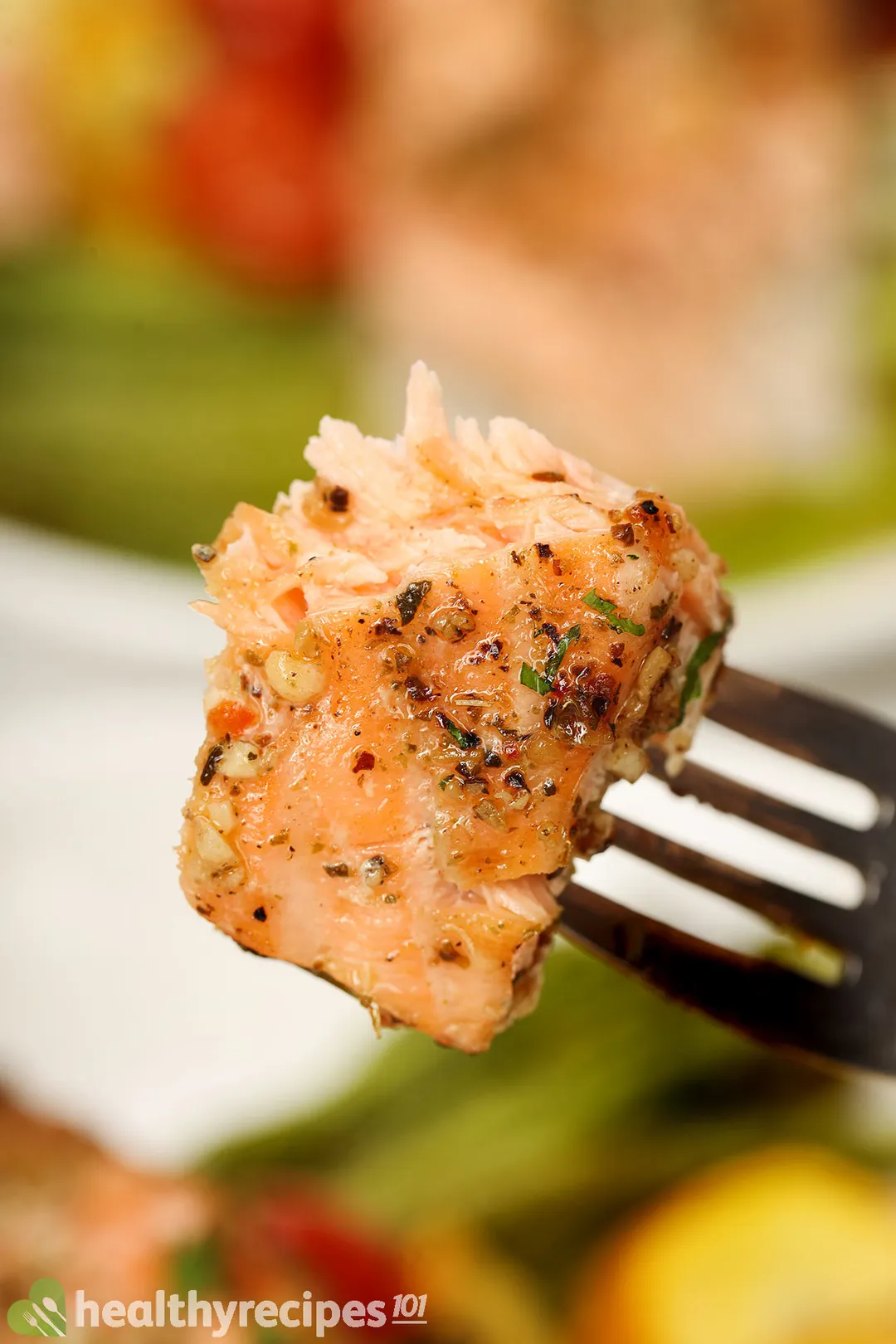 a piece of cooked salmon on a fork
