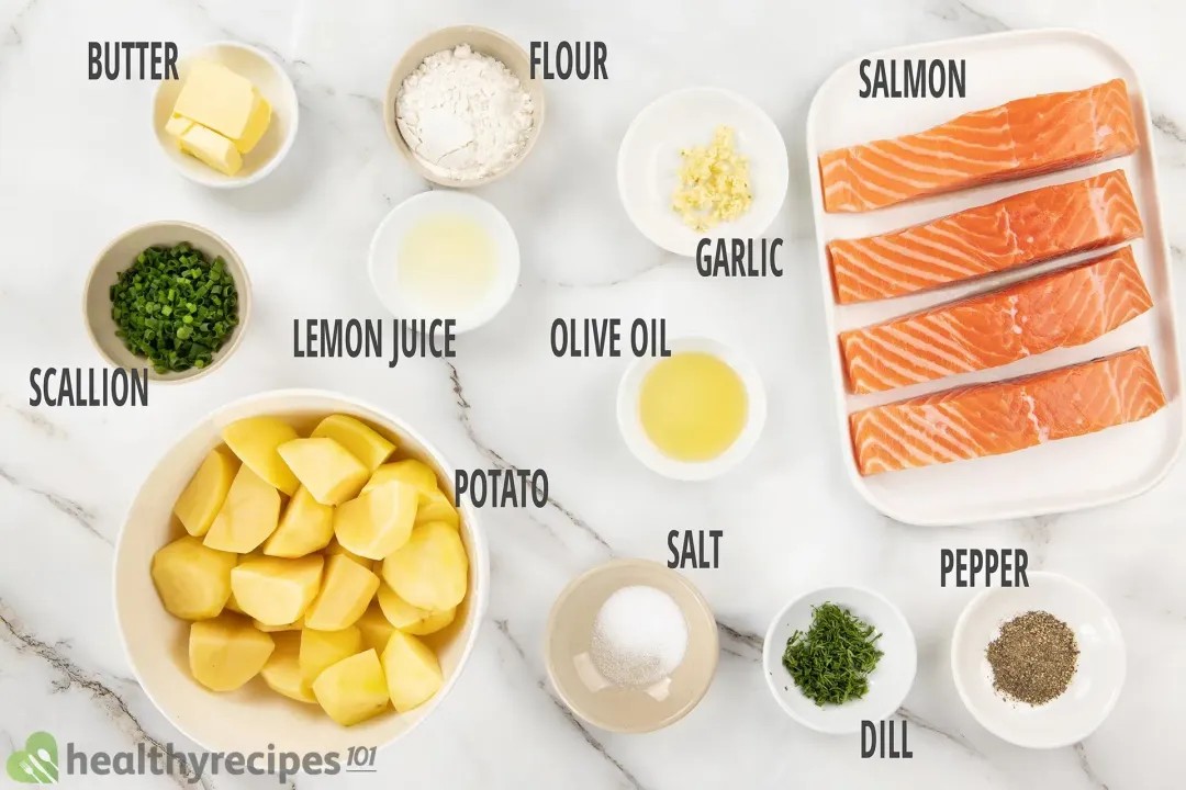Ingredients put in plates and bowls: four salmon filets, peeled potato wedges, butter, herbs, aromatics, and spices