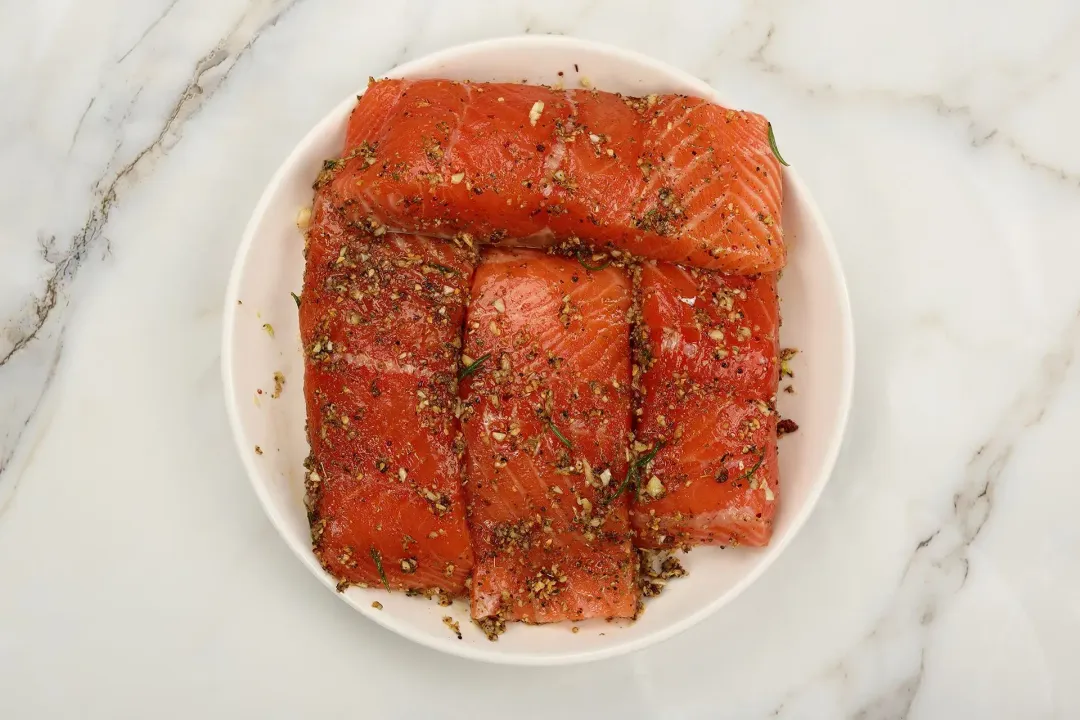 A plate of well-seasoned salmon fillets