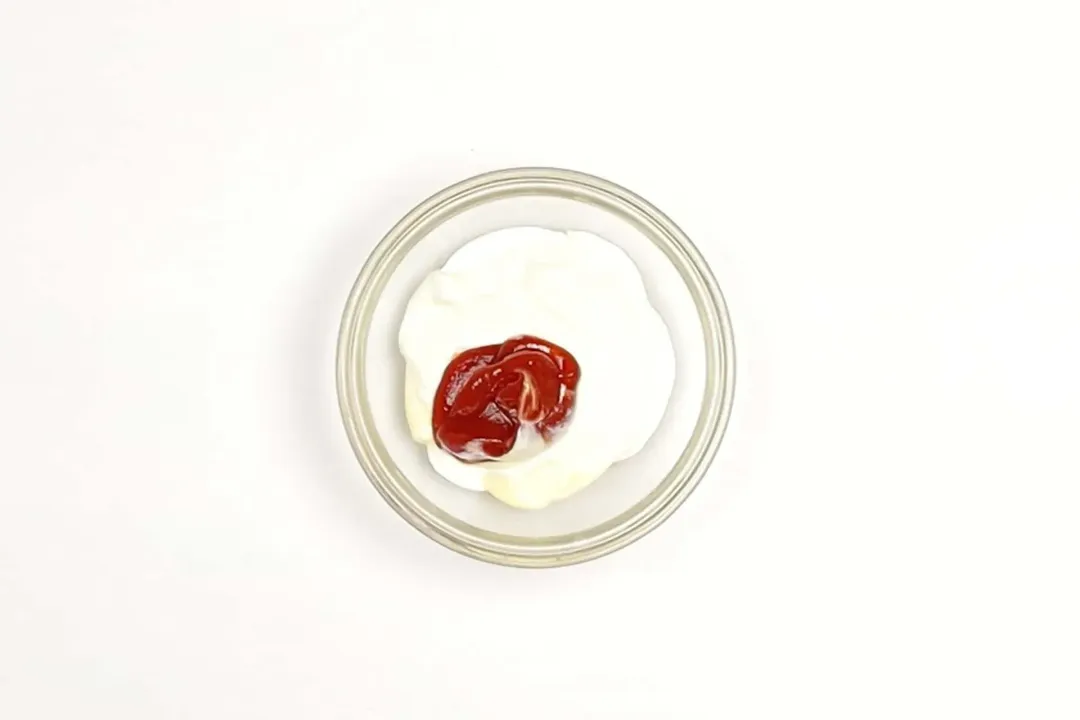 A small sauce bowl containing Greek yogurt, mayonnaise, and ketchup
