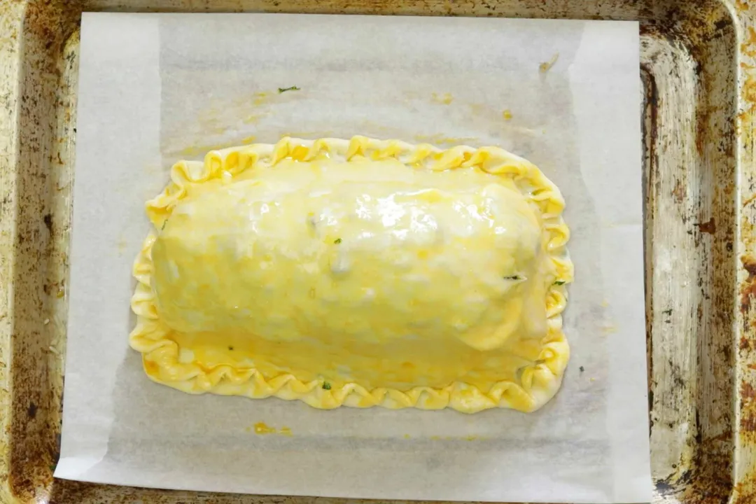 salmon coulibiac on a baking tray