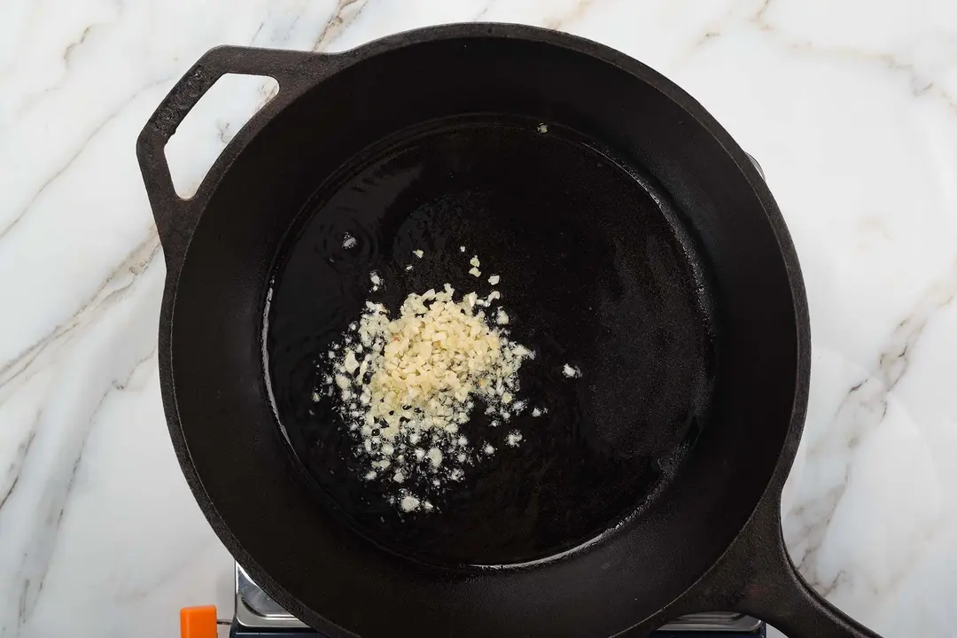 1 saute garlic in heated olive oil over medium heat until fragrant