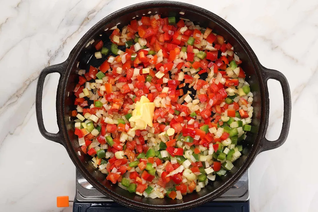 2 Cook the vegetables with some butter Shrimp Etouffee