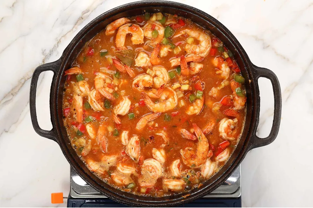 5 Add stock and simmer Shrimp Etouffee