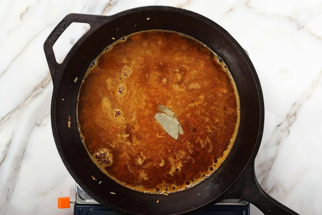 7 Add the bay leaf and star anise Give it a quick stir