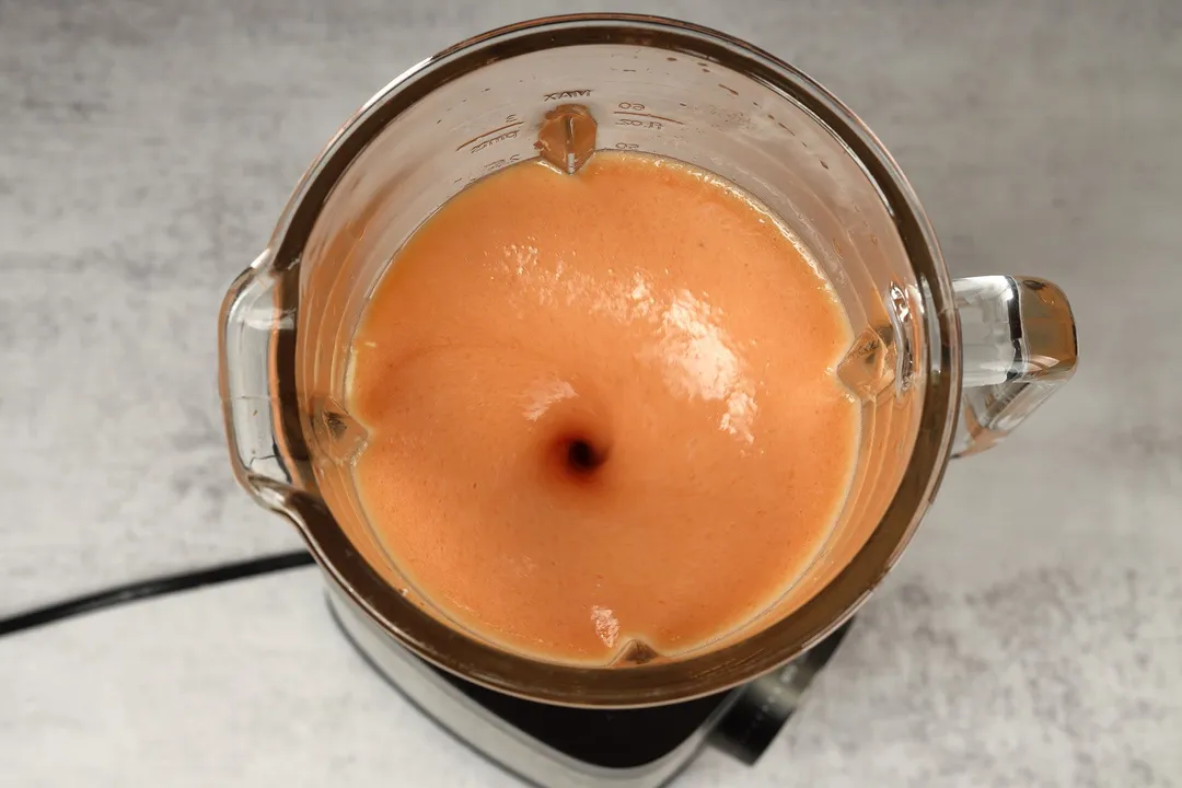 top view of a blender blending Banana Papaya Smoothie