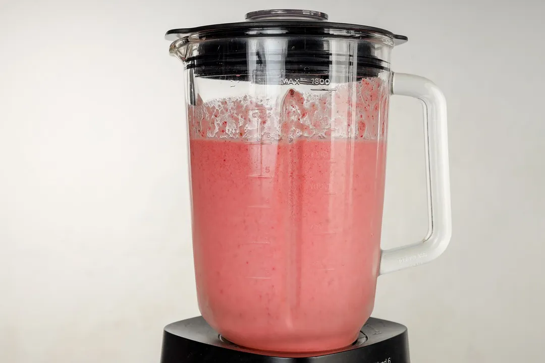 front shot of a blender pitcher of beet smoothie