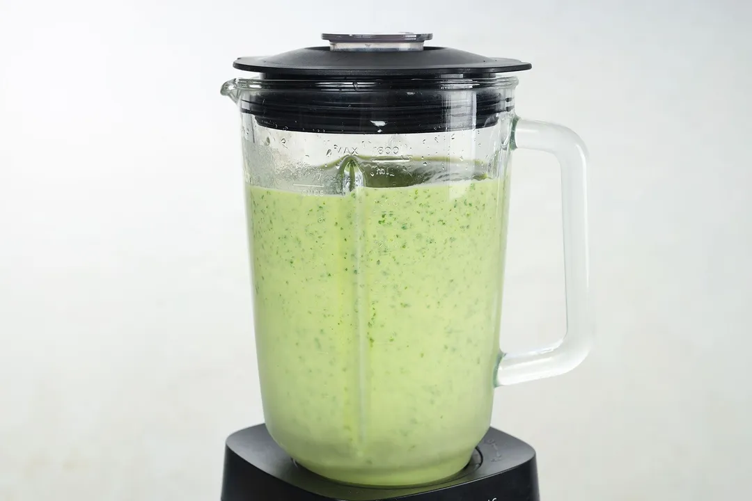 green liquid in a blender pitcher