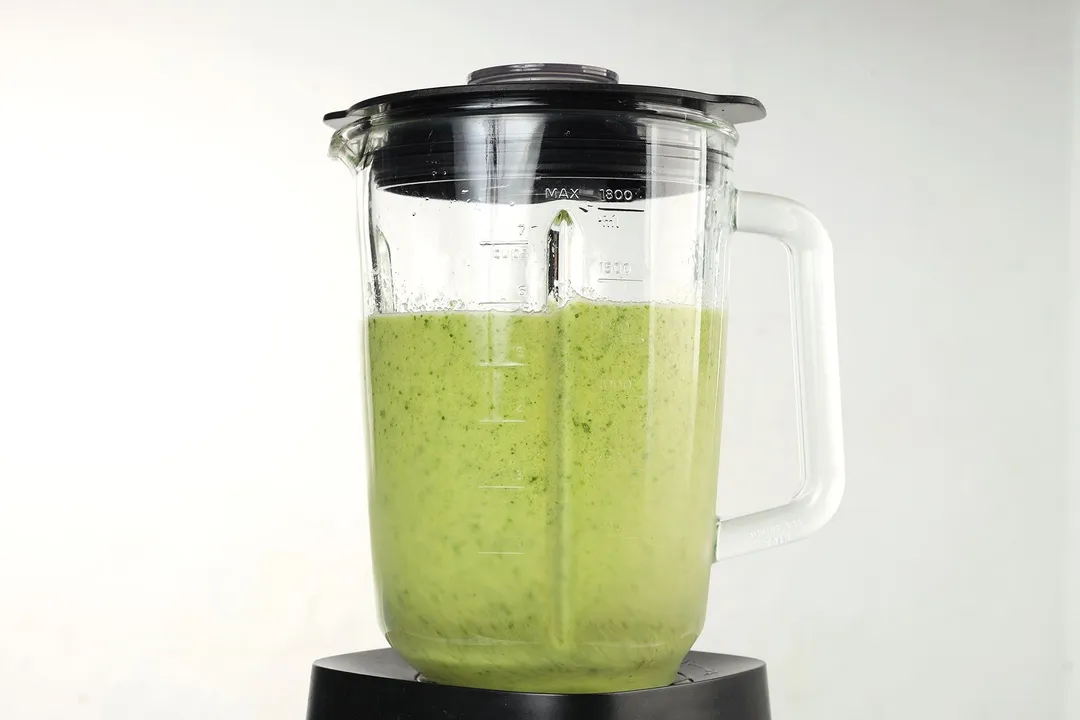 a blender of Pineapple Kale Smoothie