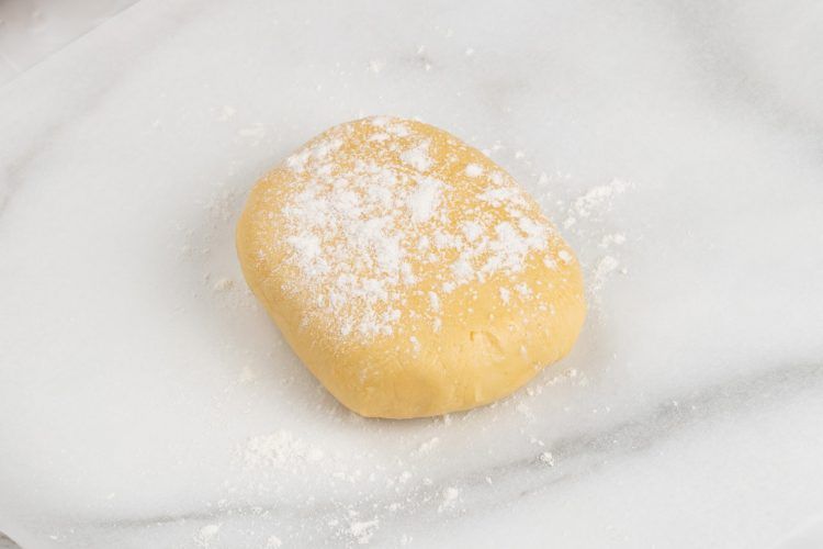 step 6: Put parchment paper over the dough