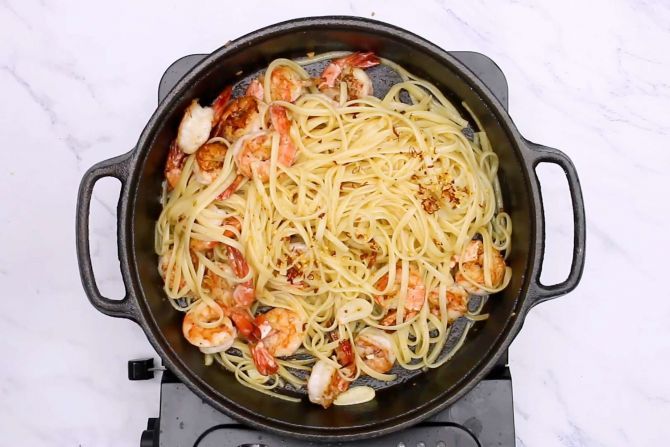 add pasta shrimp and seasonings