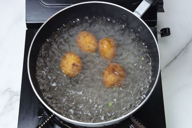 Step 3: Boil the baby potatoes until tender.