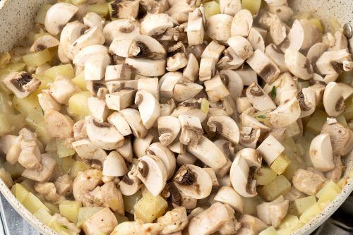 Step 5: Add potatoes, mushrooms, and seasonings.