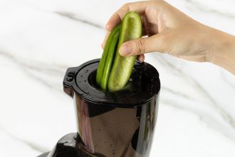 step 1: Run cucumbers through a juicer and collect the juice in a large pitcher.